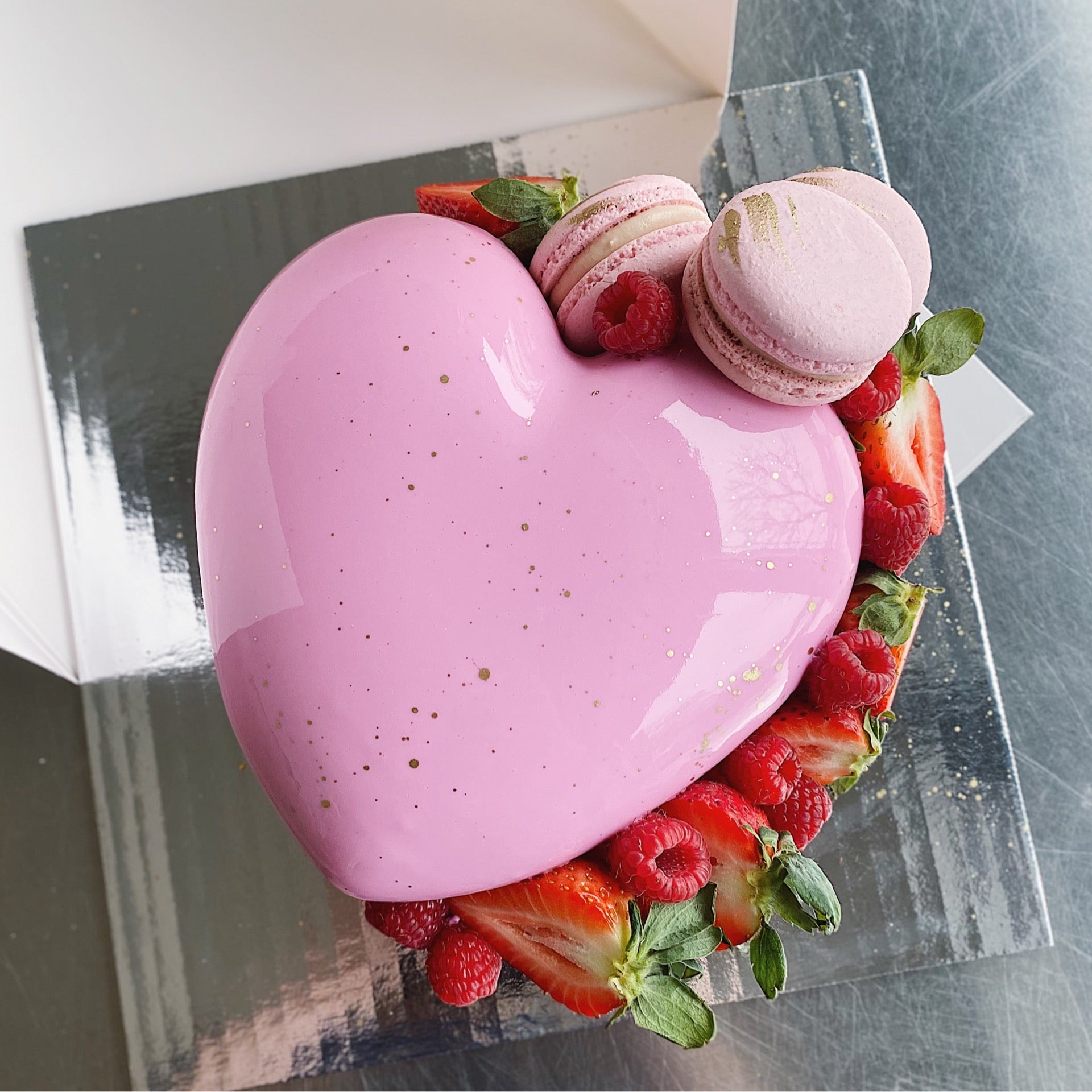 Minimalistic pink mousse cake with coated with mirror glaze on a white  background. Chocolate heart, chocolate swirl and dry heather decor. Stock  Photo by ©antonina.latayko@gmail.com 132262336
